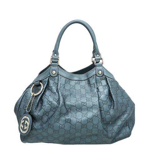 gucci guccissima blue clutch|gucci guccissima sukey bag.